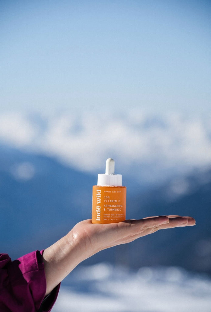 indē wild vitamin c serum in winter landscape